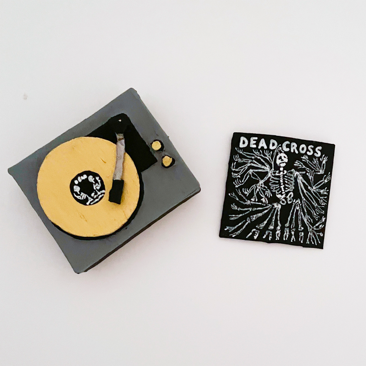 Paper Mache Dead Cross Vinyl Set with Paper Mache Record Player, overhead view