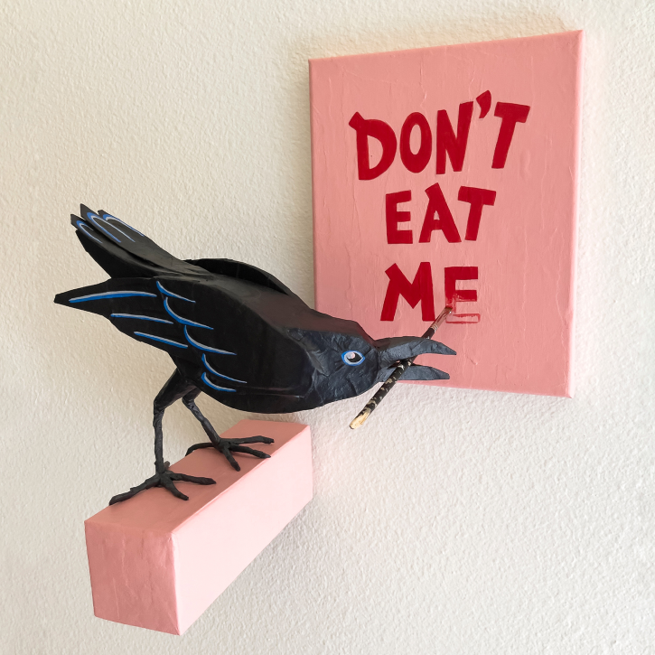 Paper Mache Crow Painting a Canvas That Says Don't Eat Me